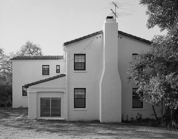 SOUTHEAST SIDE, SHOWING PORCH AND CHIMNEY