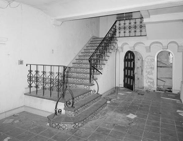 FIRST FLOOR LOBBY, SHOWING TILE WORK ON STAIRS, IRON RAILINGS, AND EXIT NEAR SOUTH END OF EAST ELEVATION