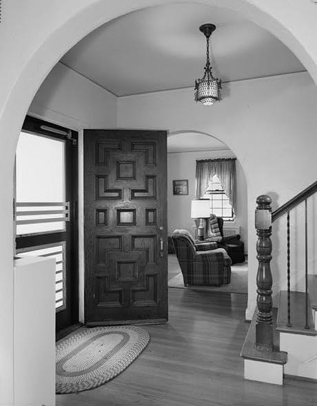  FOYER, FRONT DOOR, LOOKING TOWARD LIVING ROOM