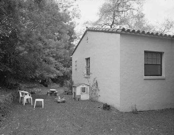  NORTHWEST CORNER, SHOWING ROCK RETAINING WALL AND BACK YARD