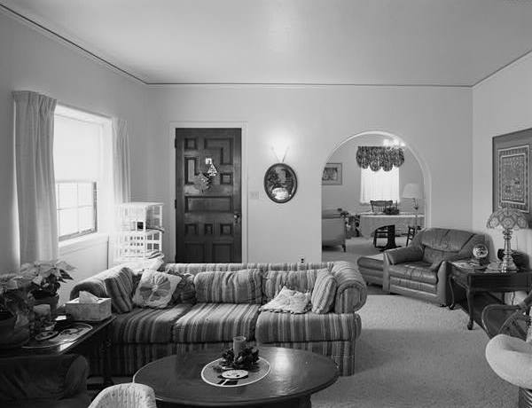  LIVING ROOM, FROM FIREPLACE, SHOWING FRONT DOOR AND DINING ROOM BEYOND