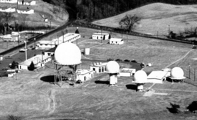 Looking northeast across the IFC area in 1972. Military family housing is at top left, with Queen Anne Bridge Road and Wayson Road intersecting in front. The road joining Wayson Road at top center is Elmer F. Hagner Lane, which leads to the launcher area, 